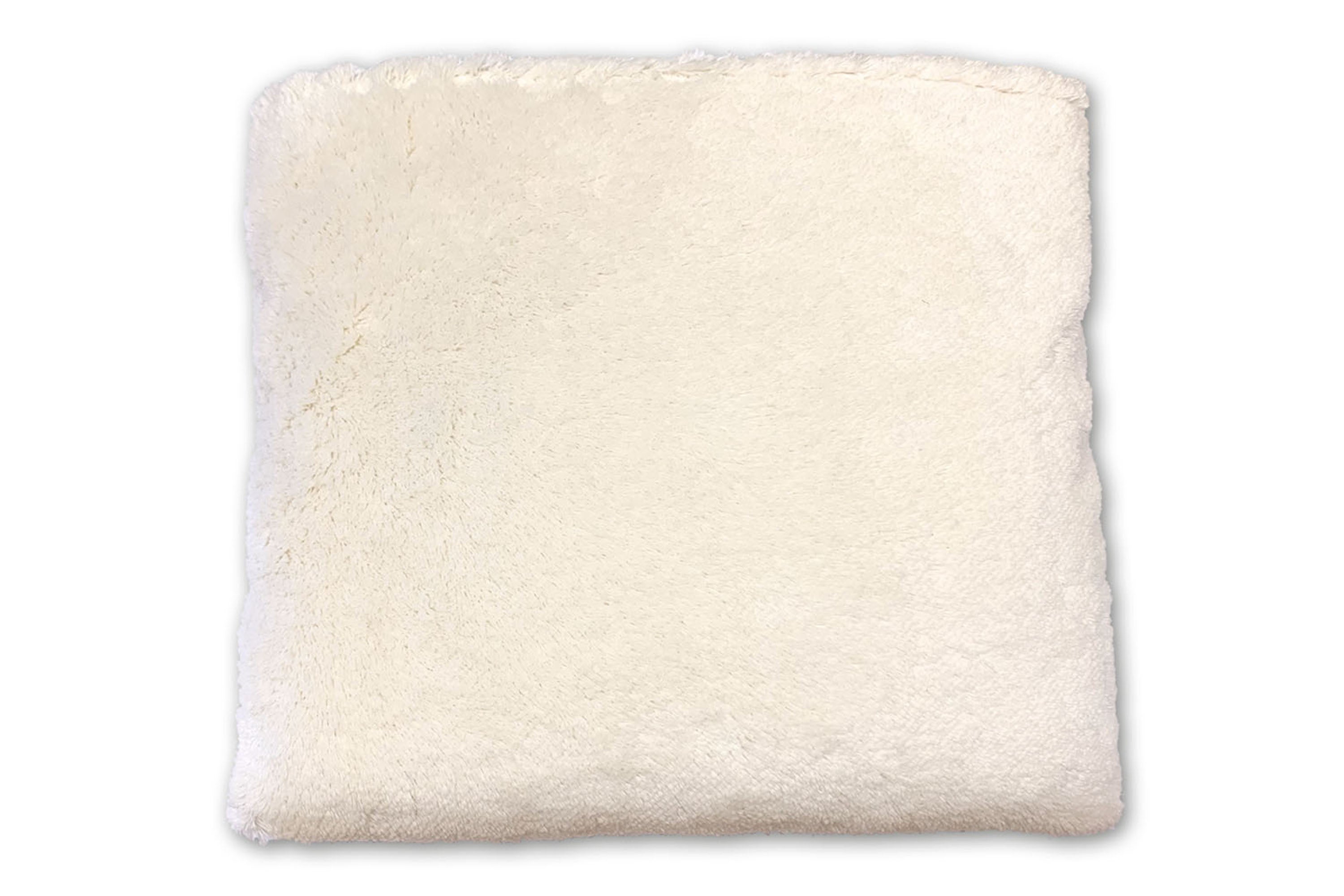 Cuddly pillow with plush and healing wool